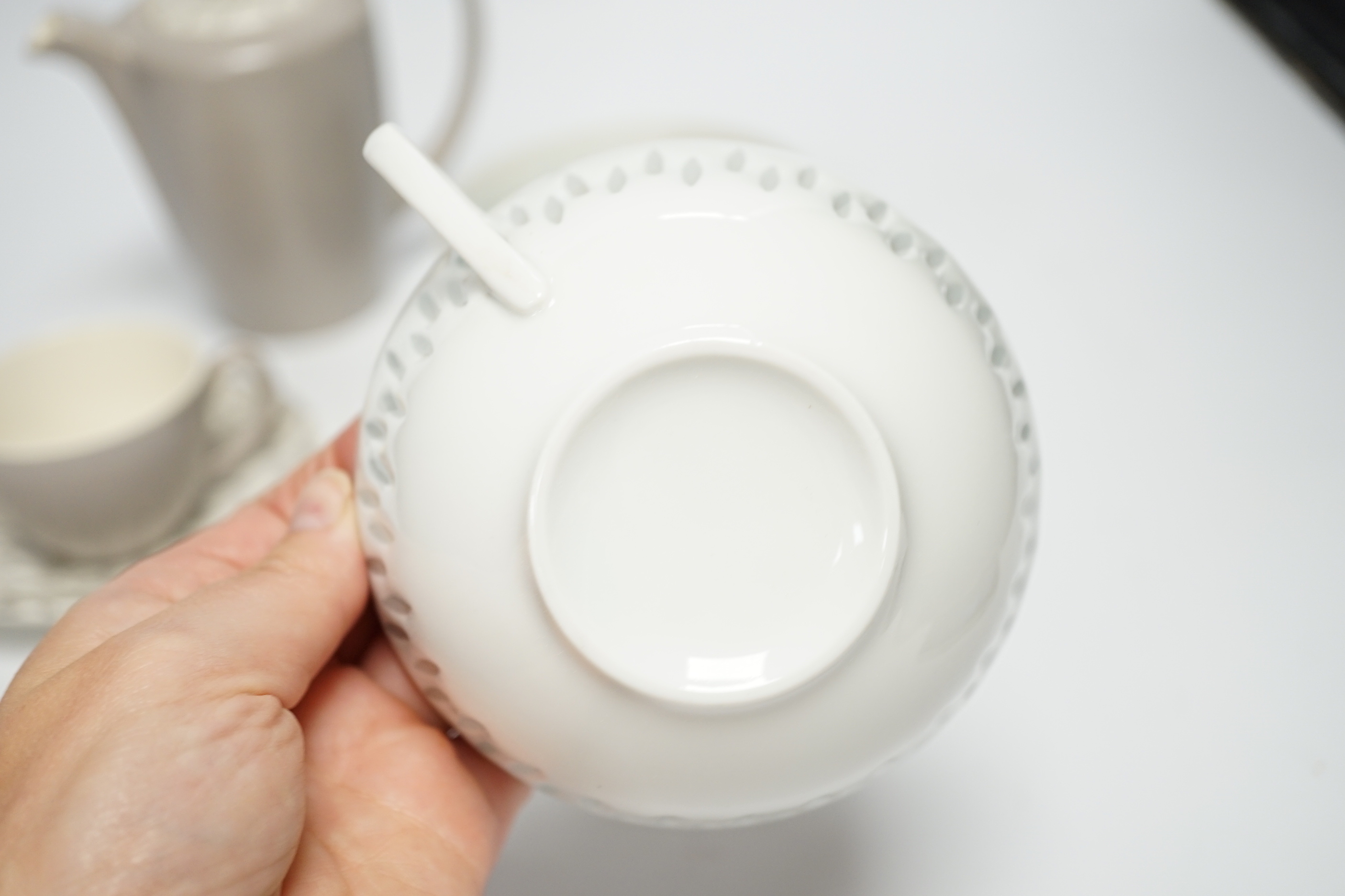 Two Arabia of Finland 'rice' porcelain cups and saucers and a Poole part coffee service